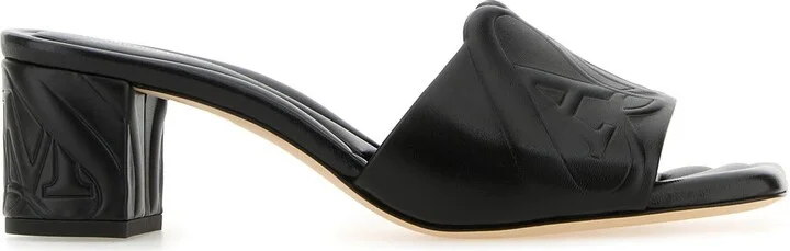Black leather Seal mules