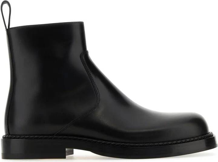 Black leather Strut ankle boots