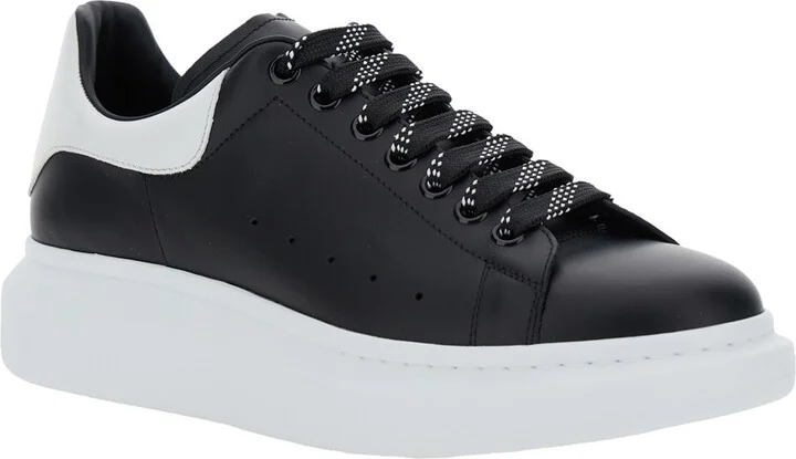 Black Low Top Sneakers With Chunky Sole And Contrasting Heel In Leather Man