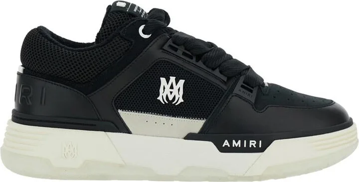 Black Low Top Sneakers With Logo Patch On The Tongue And Logo Lettering On The Heel In Leather Man