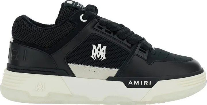 Black Low Top Sneakers With Logo Patch On The Tongue And Logo Lettering On The Heel In Leather Man
