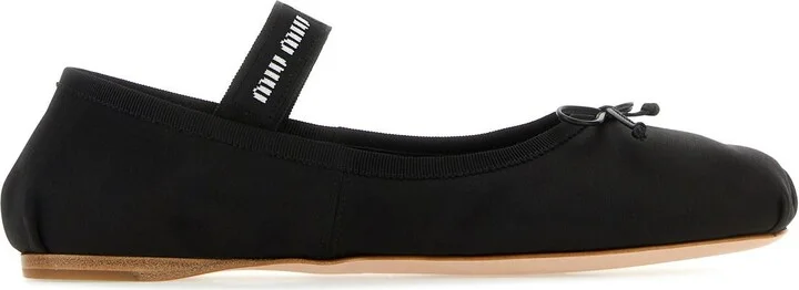 Black satin ballerinas