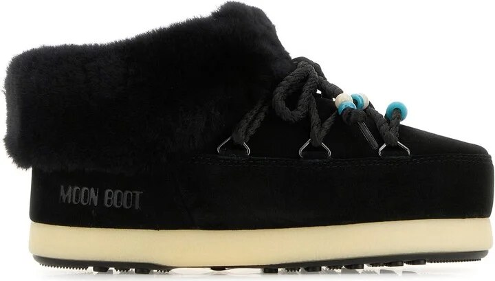 Black suede EVX slip ons