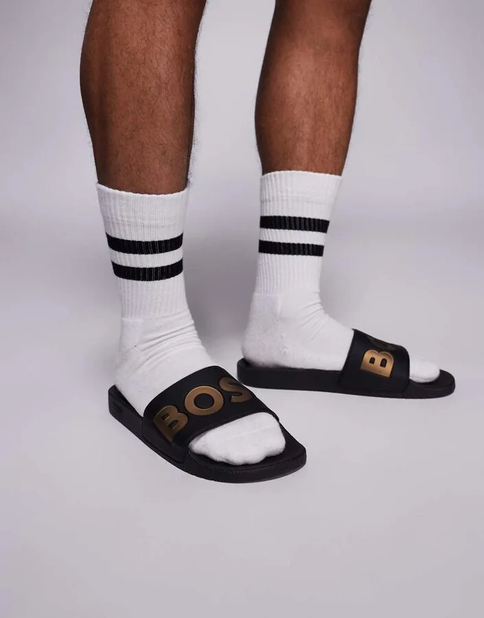 BOSS Aryeh contrast logo slider in black and gold