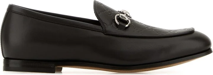 Brown leather loafers