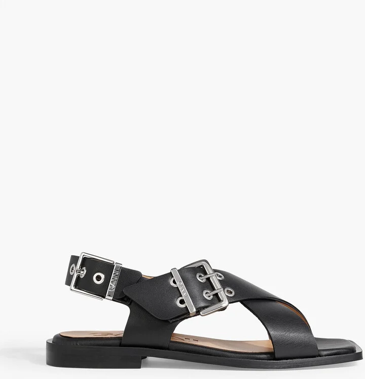 Buckled leather-blend slingback sandals