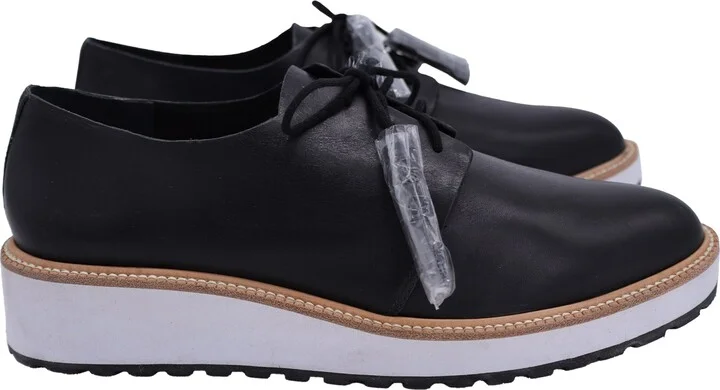 Callie Demi-Wedge Oxfords in Black Leather