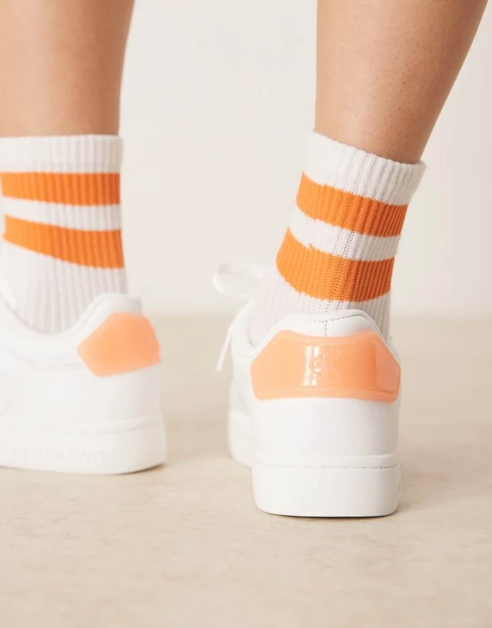 Calvin Klein Jeans classic cupsole sneakers in white and orange - Image 4