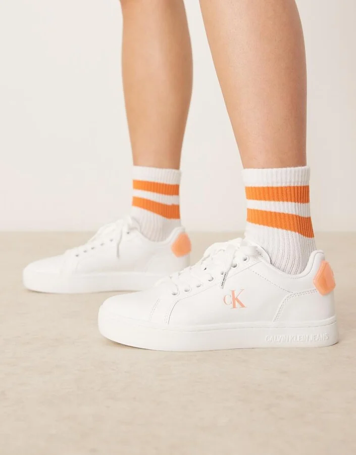 Calvin Klein Jeans classic cupsole sneakers in white and orange