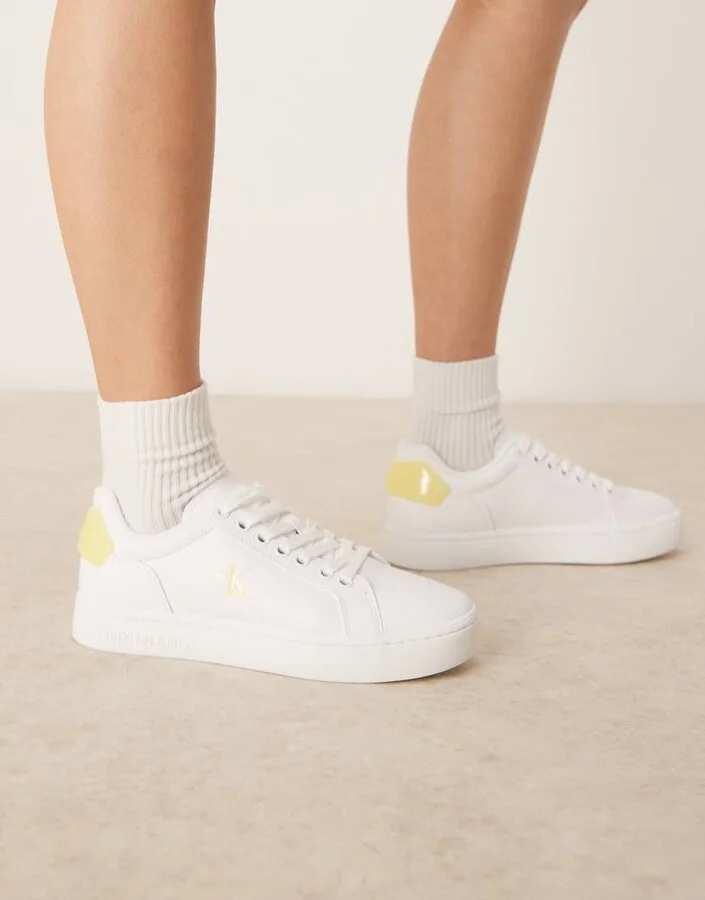 Calvin Klein Jeans classic cupsole sneakers in white and yellow