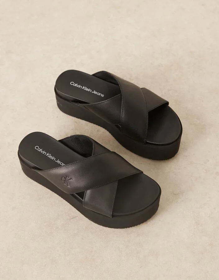 Calvin Klein Jeans cross strap flatform sandals in black - Image 3