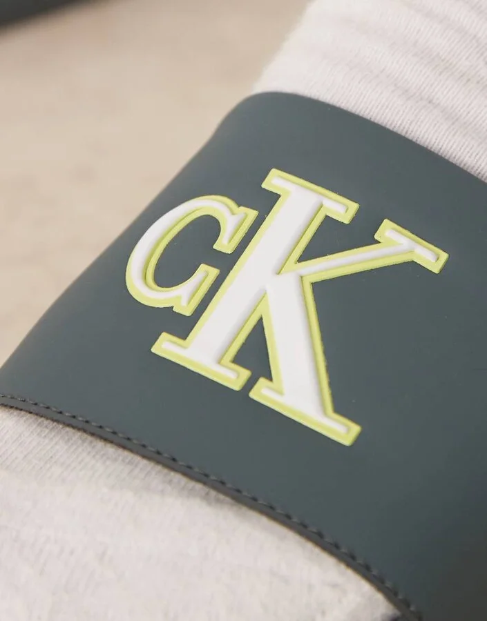 Calvin Klein Jeans large logo slides in teal, lime, and white - Image 3