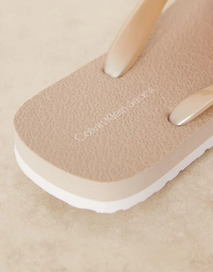 Calvin Klein Jeans logo flip flops in champagne - Image 3