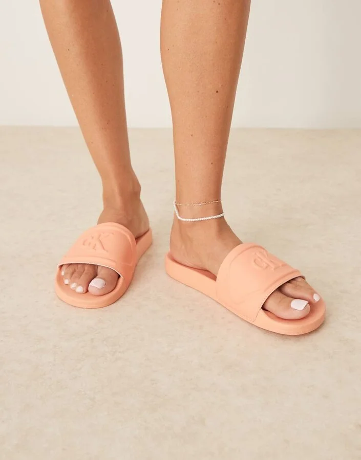 Calvin Klein Jeans logo puff slides in pastel orange - Image 3
