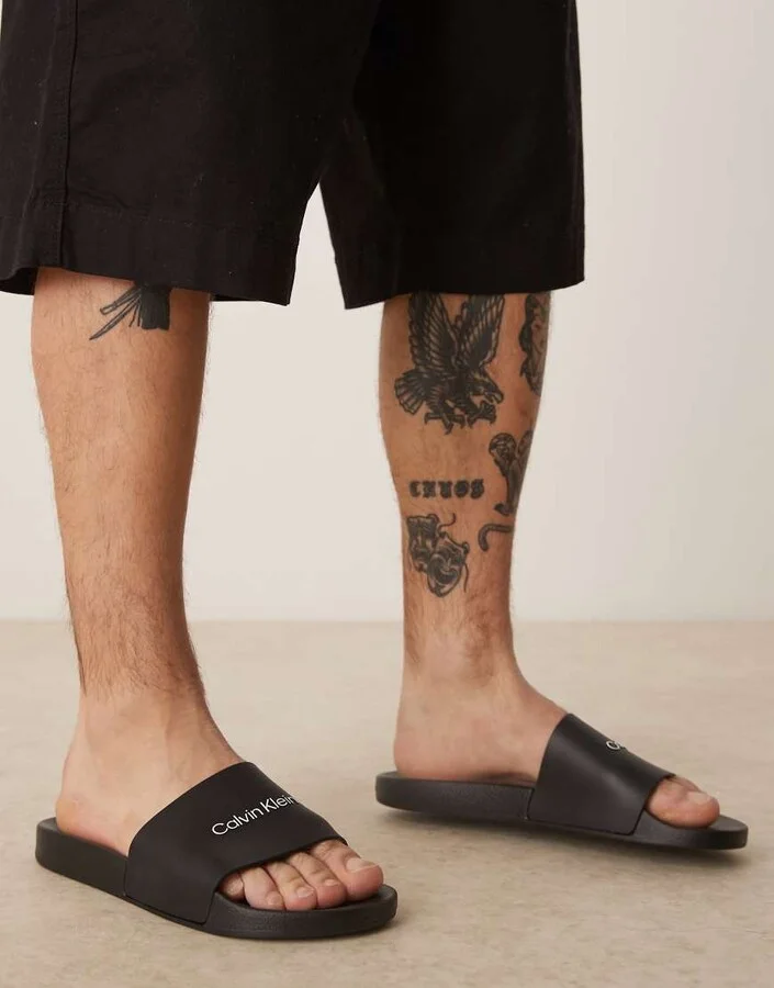 Calvin Klein logo slides in black