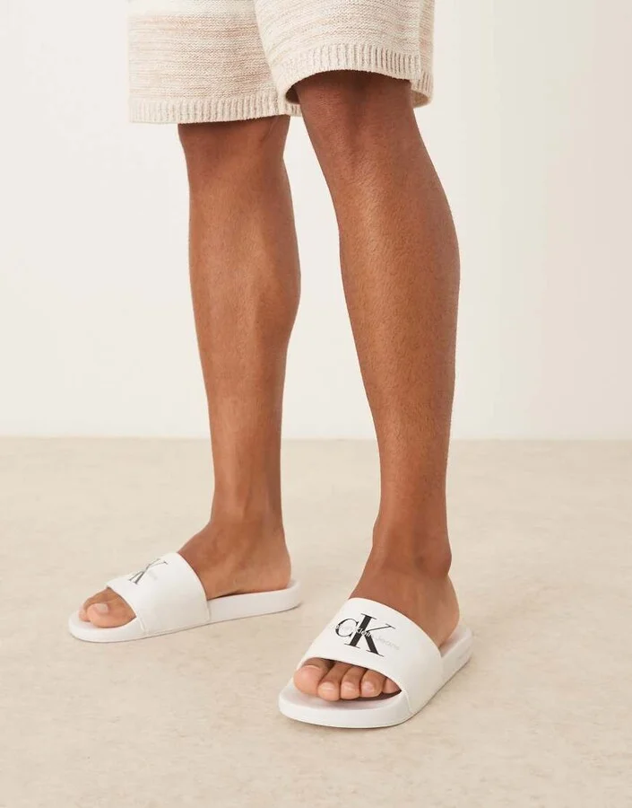 Calvin Klein monogram slides in white and black