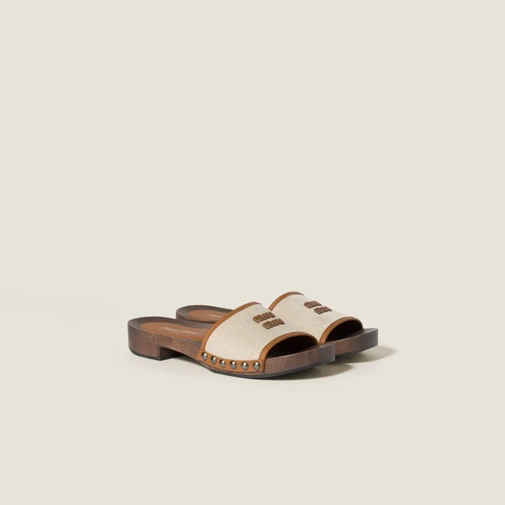 Canvas and leather clogs