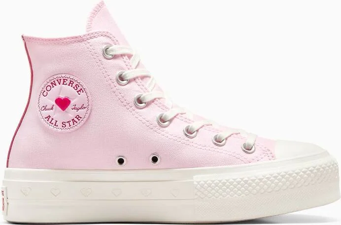 Converse Chuck Taylor All Star Lift sneakers in pink with red lace detail