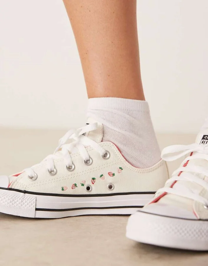 Converse Chuck Taylor All Star sneakers in white with strawberry detailing