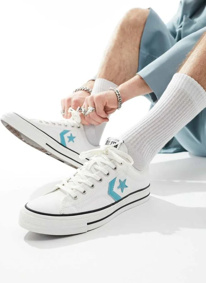 Converse Star Player 76 sneakers in white with blue detail