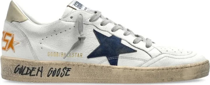 Distressed Low-Top Sneakers With Star Detail And Vintage Aesthetic