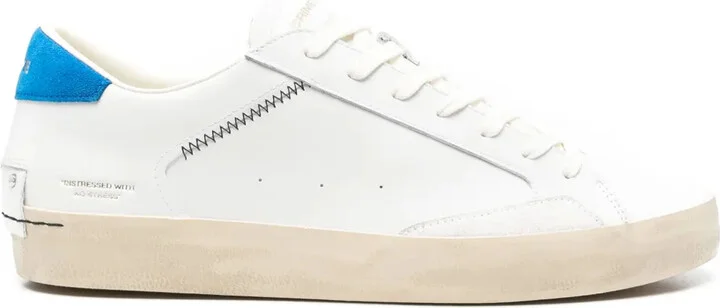 Distressed sneakers