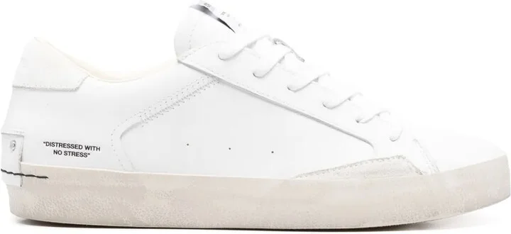 Distressed sneakers