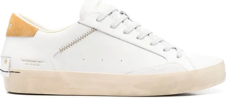 Distressed sneakers