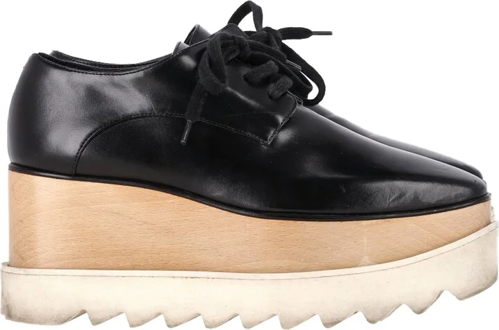Elyse Platform Derby Sneakers in Black Faux Leather