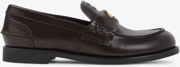 Embossed Logo Penny Loafers in Brushed Leather
