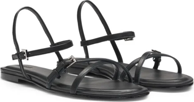 Flat sandals in nappa leather with logo buckles