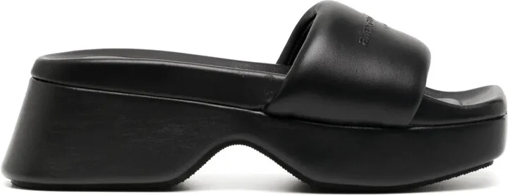 Float logo-debossed platform slides