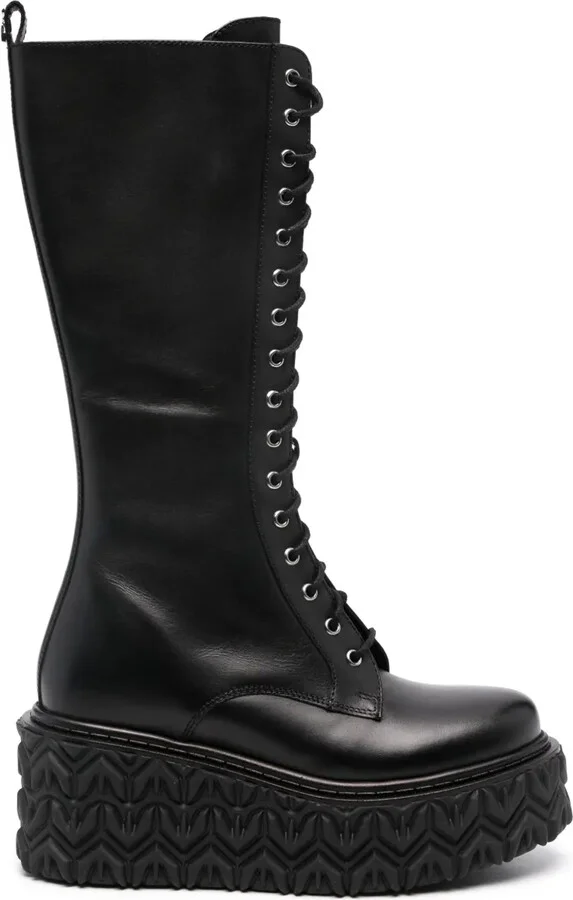 Fly-embossed wedge boots