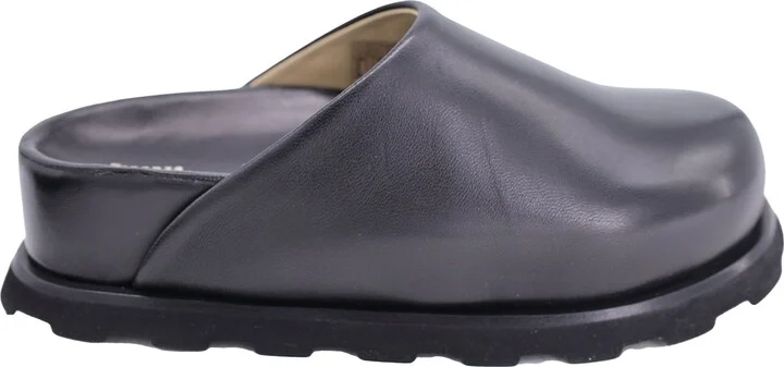 Forma Mules in Black Leather