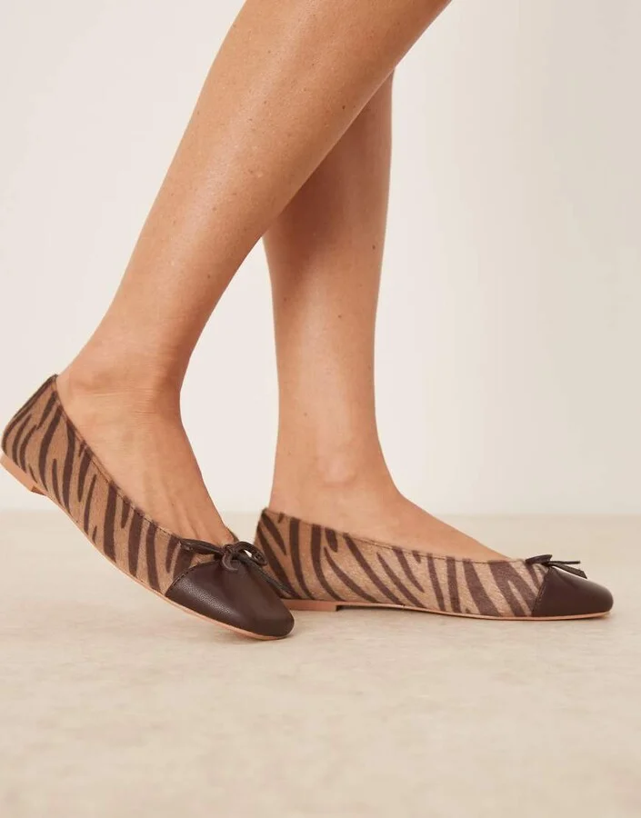 Glamorous ballet flats in brown zebra print