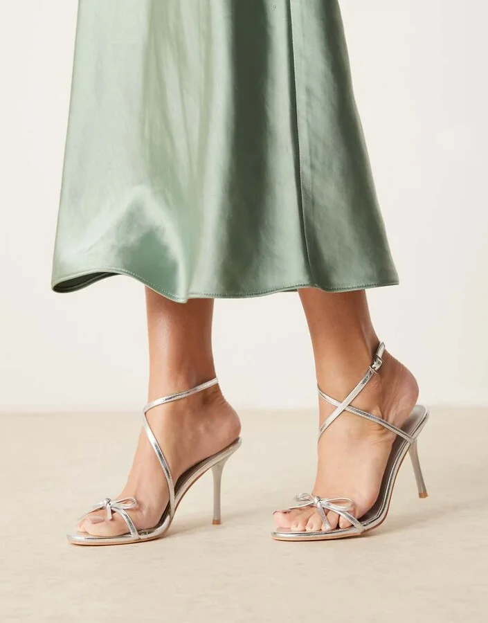 Glamorous bow heeled sandals in silver crinkle