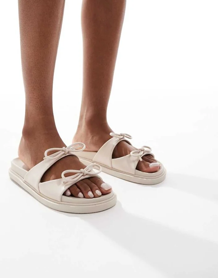 Glamorous double bow footbed sandals in cream