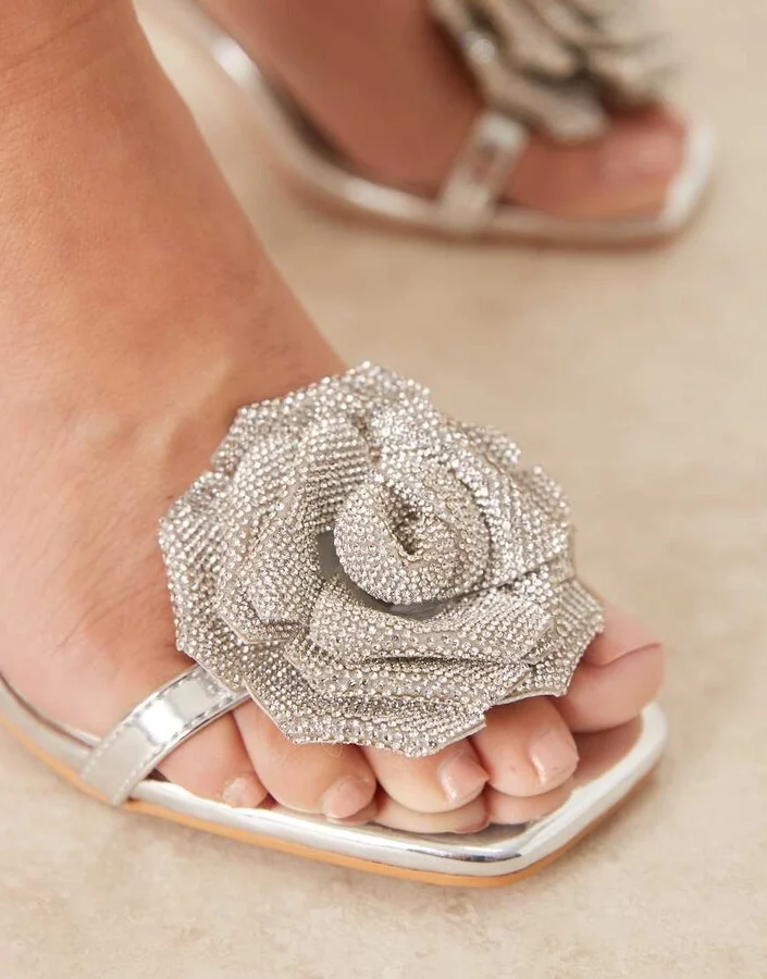Glamorous stiletto heeled sandals wth flower details in silver - Image 3