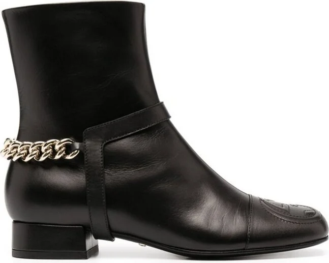 Gucci Logo Embossed Ankle Boots