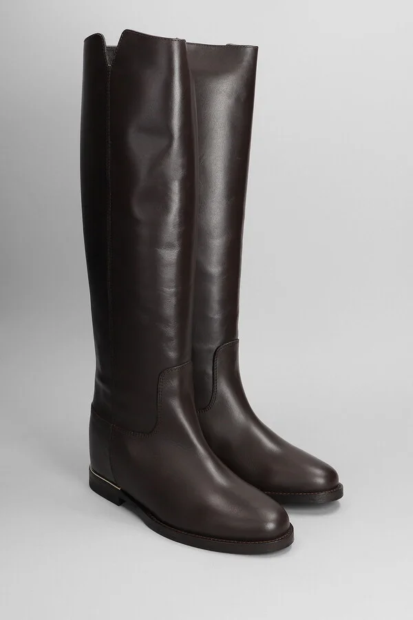 In Dark Brown Leather - Image 2