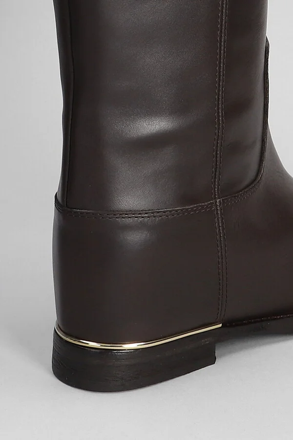 In Dark Brown Leather - Image 5