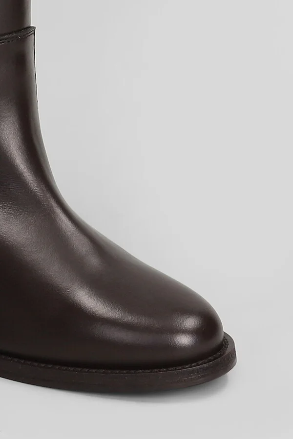 In Dark Brown Leather - Image 5