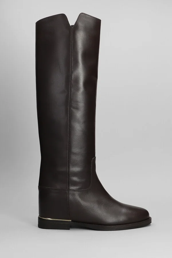 In Dark Brown Leather