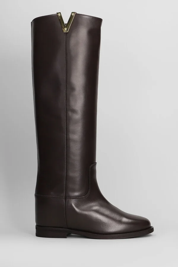 In Dark Brown Leather