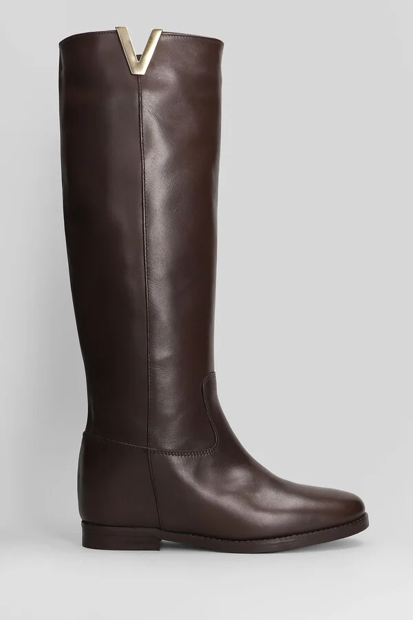 In Dark Brown Leather