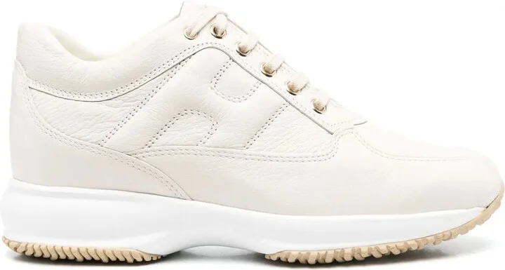 Interactive lace-up sneakers