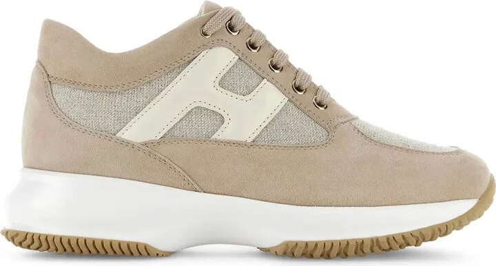 Interactive logo-embossed sneakers