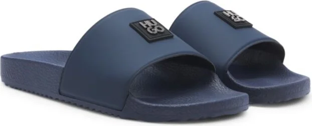 Italian-made slides with contrast-logo strap