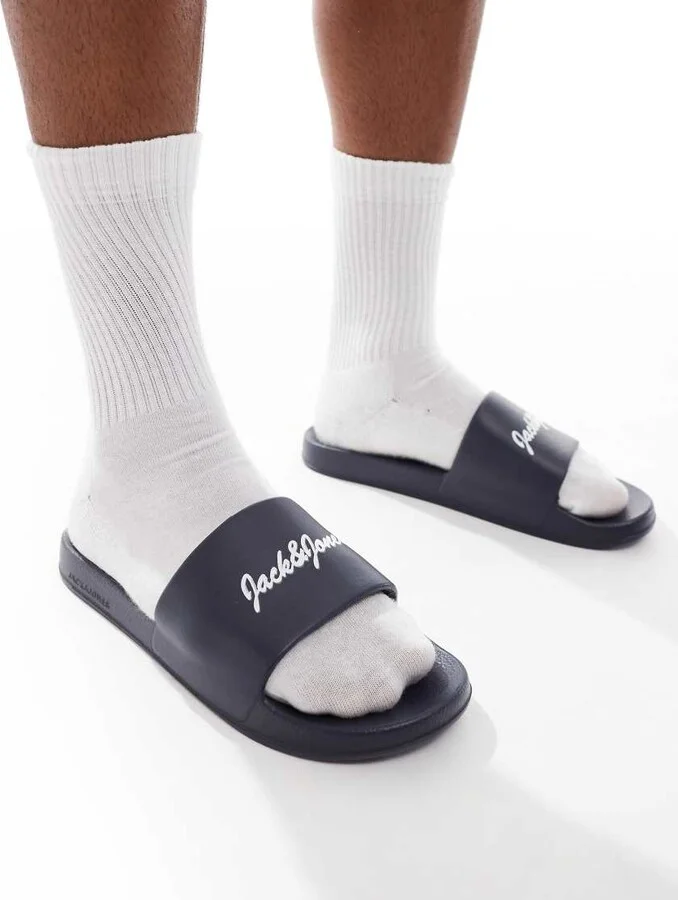 Jack & Jones logo slides in navy
