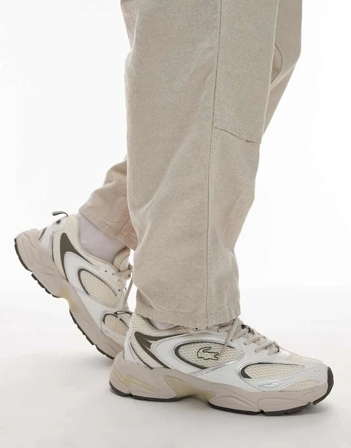 Lacoste storm 96 2K sneakers in off white/khaki green